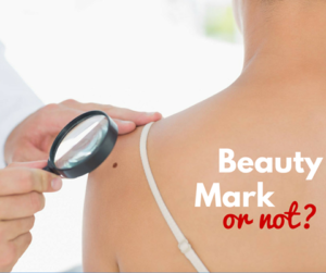 dermatologist looking at mole on womans shoulder