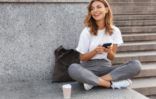 Girl Smiling With Phone